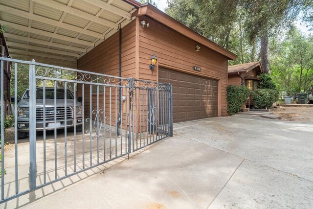 8516 Valley View Trl, Pine Valley, CA 91962 - view of side of property with a garage, driveway, and a gate