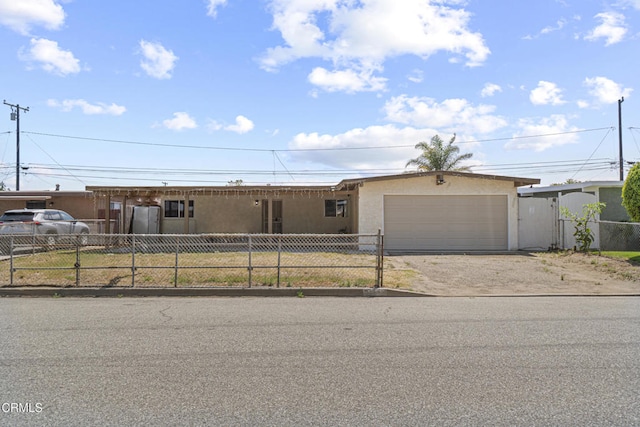 374 Will Ave, Oxnard, CA 93036 - ranch-style home featuring driveway, a fenced front yard, and a garage