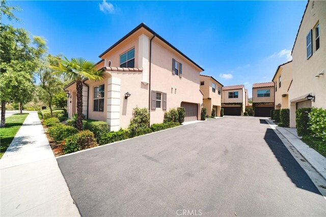 102 Anthology, Irvine, CA 92618 - view of asphalt road with a residential view