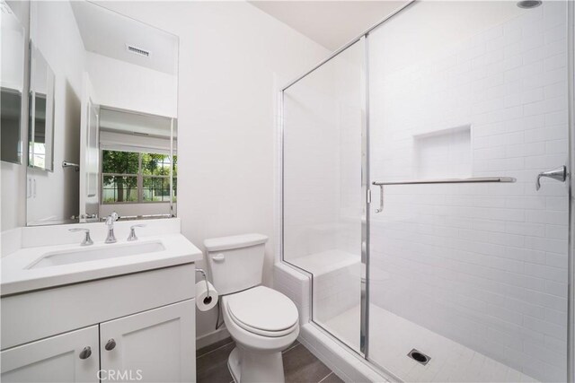 102 Anthology, Irvine, CA 92618 - bathroom with a stall shower, vanity, and toilet