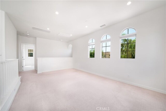 102 Anthology, Irvine, CA 92618 - spare room with light colored carpet, recessed lighting, and baseboards