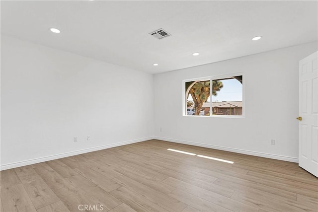 7495 Balsa Ave, Yucca Valley, CA 92284 - unfurnished room featuring light wood finished floors and recessed lighting