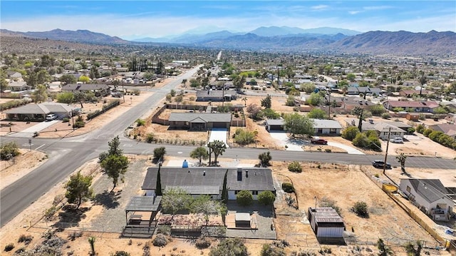7495 Balsa Ave, Yucca Valley, CA 92284 - aerial perspective of suburban area with a mountain backdrop
