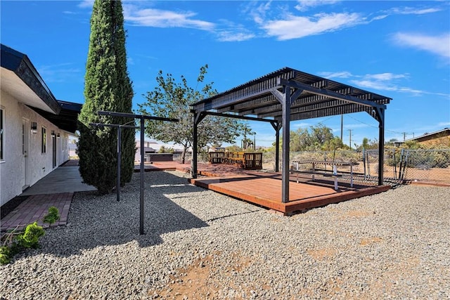 7495 Balsa Ave, Yucca Valley, CA 92284 - view of yard with a wooden deck and a pergola
