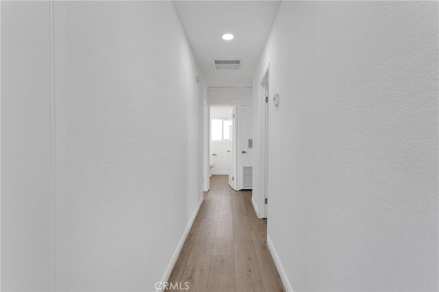 7495 Balsa Ave, Yucca Valley, CA 92284 - hallway with light wood-type flooring and recessed lighting