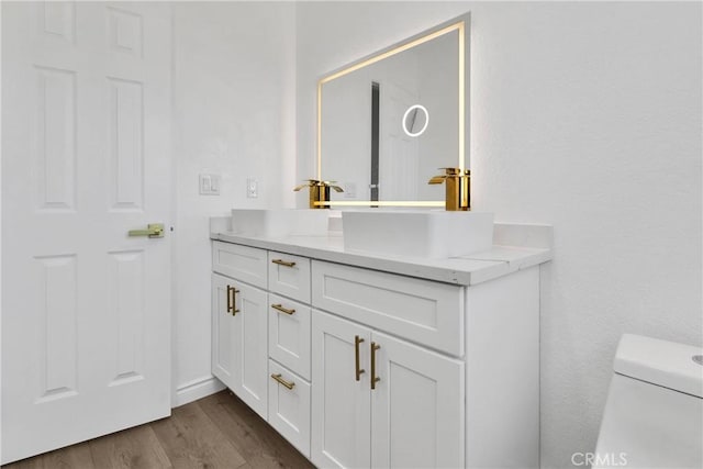 7495 Balsa Ave, Yucca Valley, CA 92284 - bathroom with vanity and wood finished floors