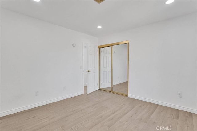 7495 Balsa Ave, Yucca Valley, CA 92284 - empty room with recessed lighting and light wood-style flooring
