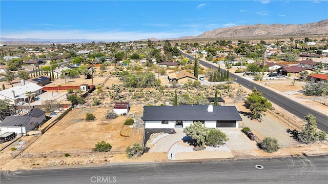 7495 Balsa Ave, Yucca Valley, CA 92284 - aerial view of residential area with a mountainous background