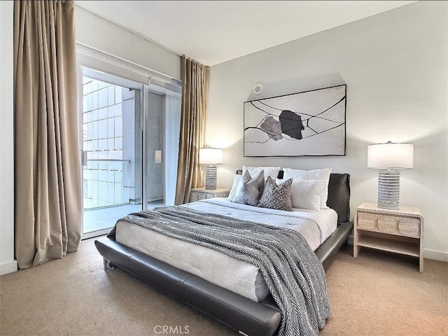 6250 Hollywood Blvd Unit 7G, Los Angeles, CA 90028 - bedroom featuring light carpet and baseboards