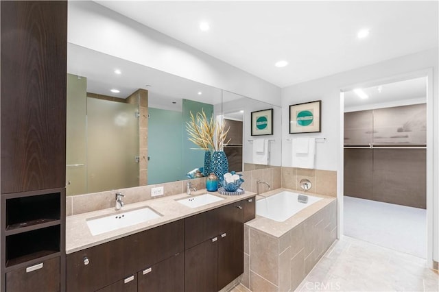 6250 Hollywood Blvd Unit 7G, Los Angeles, CA 90028 - full bathroom with a bath, double vanity, and recessed lighting