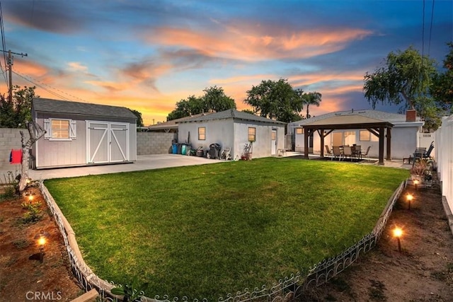 809 San Marino Ave, Montebello, CA 90640 - back of house at dusk with a patio and a gazebo
