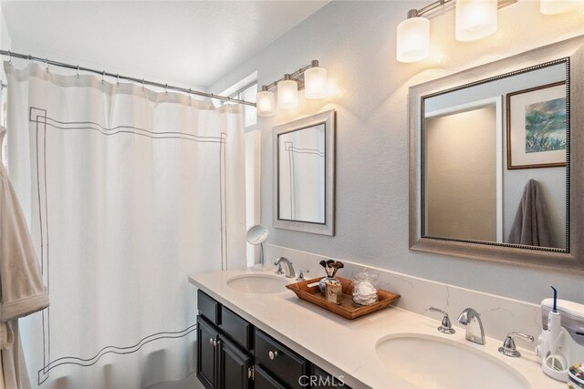 40280 Mimulus Way, Temecula, CA 92591 - full bathroom with double vanity and curtained shower