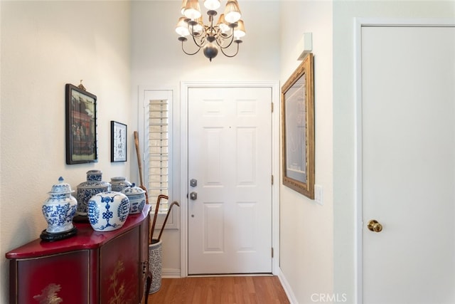 40280 Mimulus Way, Temecula, CA 92591 - entrance foyer featuring a chandelier, light wood finished floors, and baseboards