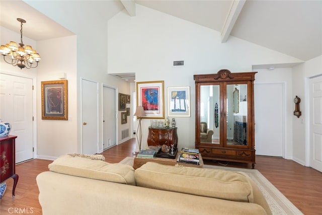 40280 Mimulus Way, Temecula, CA 92591 - living room featuring a chandelier, beam ceiling, wood finished floors, high vaulted ceiling, and baseboards