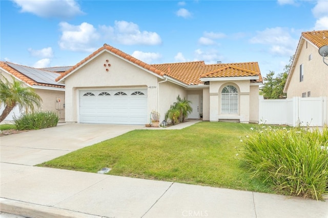 40280 Mimulus Way, Temecula, CA 92591 - mediterranean / spanish house featuring a garage, concrete driveway, a tile roof, and stucco siding