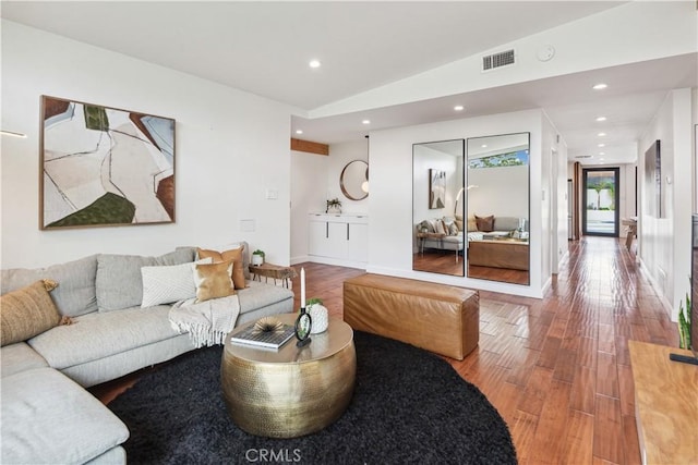 377 Flint Ave, Long Beach, CA 90814 - living area with wood finished floors, recessed lighting, and lofted ceiling