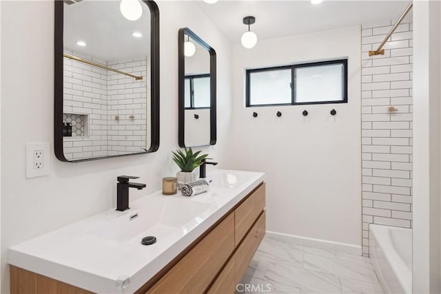 377 Flint Ave, Long Beach, CA 90814 - bathroom with double vanity, marble look tile flooring,  shower combination, and recessed lighting