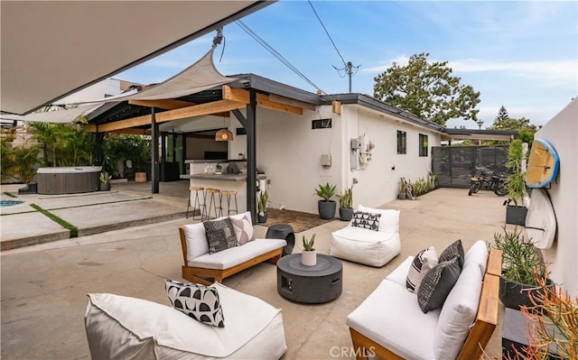 377 Flint Ave, Long Beach, CA 90814 - view of patio / terrace featuring a hot tub, outdoor lounge area, and exterior bar