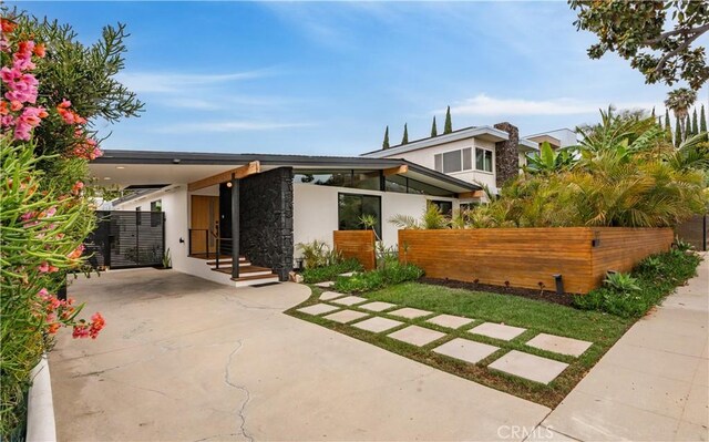 377 Flint Ave, Long Beach, CA 90814 - modern home featuring stone siding and stucco siding