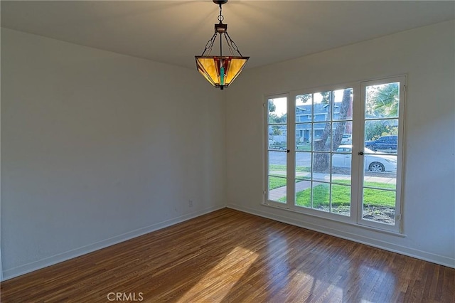 550 N 1st Ave, Upland, CA 91786 - empty room featuring baseboards and dark wood-type flooring