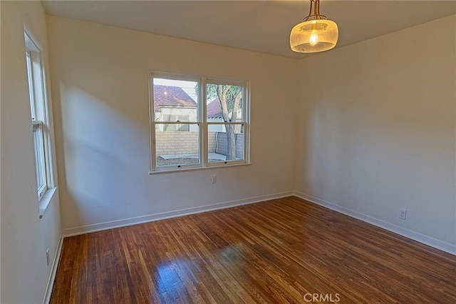 550 N 1st Ave, Upland, CA 91786 - empty room featuring dark wood-style flooring and baseboards