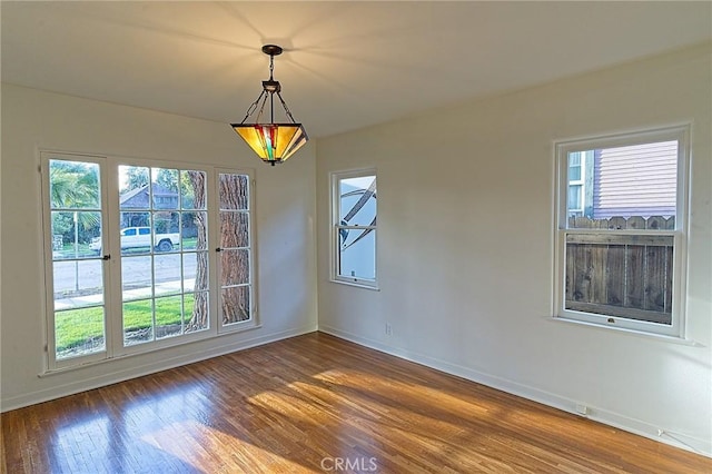 550 N 1st Ave, Upland, CA 91786 - empty room with wood finished floors, plenty of natural light, and baseboards