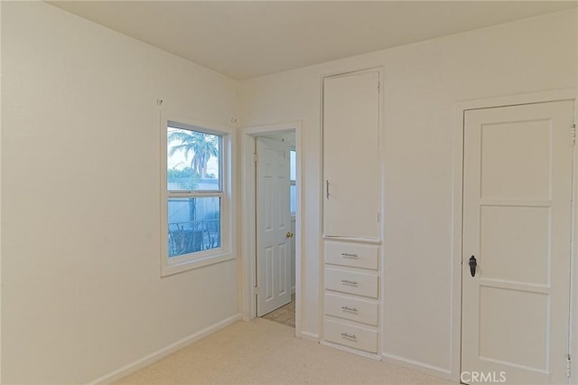 550 N 1st Ave, Upland, CA 91786 - unfurnished bedroom with light carpet and baseboards