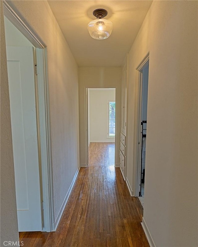 550 N 1st Ave, Upland, CA 91786 - corridor featuring dark wood-style floors and baseboards