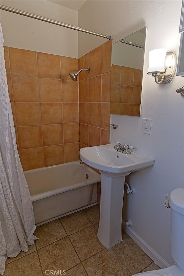 550 N 1st Ave, Upland, CA 91786 - full bathroom featuring shower / bath combination with curtain, tile patterned floors, toilet, and a sink