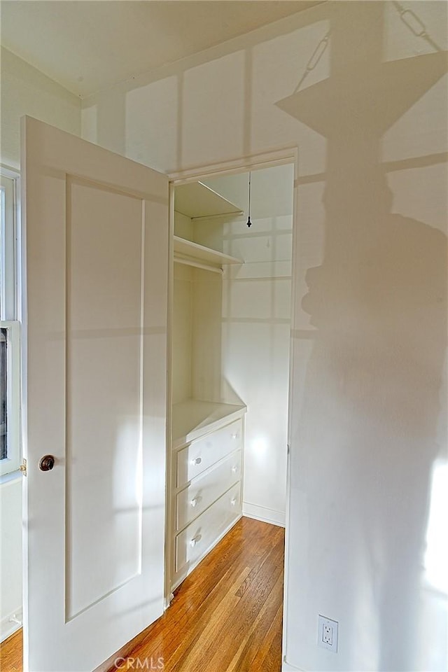 550 N 1st Ave, Upland, CA 91786 - walk in closet with light wood-style flooring