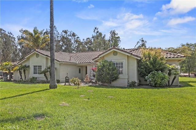 1350 Cardo Way, Nipomo, CA 93444 - view of front facade featuring a tiled roof, a front lawn, and stucco siding