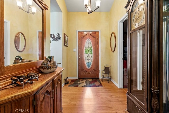 1350 Cardo Way, Nipomo, CA 93444 - foyer featuring light wood finished floors, a chandelier, and baseboards