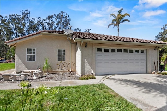 1350 Cardo Way, Nipomo, CA 93444 - mediterranean / spanish home featuring a garage, driveway, stucco siding, and a tiled roof