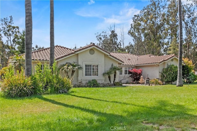 1350 Cardo Way, Nipomo, CA 93444 - view of front of home featuring stucco siding, a front yard, and a tile roof