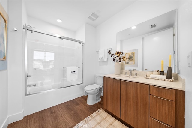 709 E Walnut St Unit 415, Pasadena, CA 91101 - full bath with vanity, bath / shower combo with glass door, wood finished floors, and recessed lighting