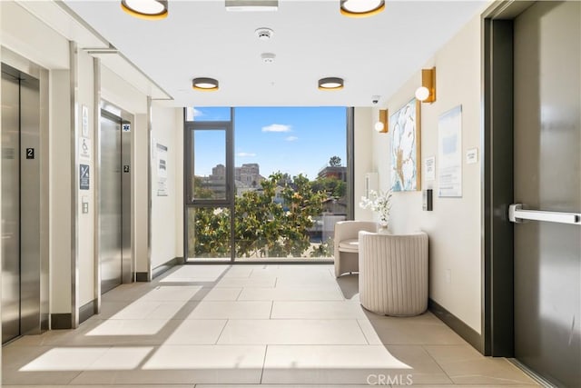 709 E Walnut St Unit 415, Pasadena, CA 91101 - common area with expansive windows and a surveillance system