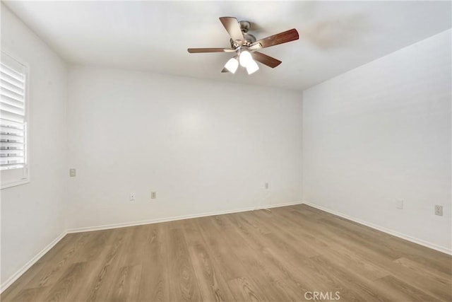 27057 Rangewood St, Menifee, CA 92586 - unfurnished room featuring light wood finished floors, a ceiling fan, baseboards, and healthy amount of natural light