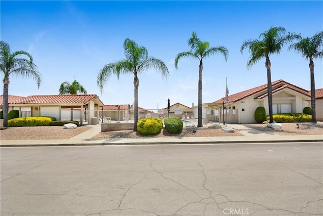 27057 Rangewood St, Menifee, CA 92586 - mediterranean / spanish-style house featuring a tiled roof, stucco siding, and a residential view