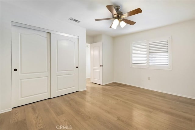 27057 Rangewood St, Menifee, CA 92586 - unfurnished bedroom with a closet, light wood-type flooring, baseboards, and ceiling fan