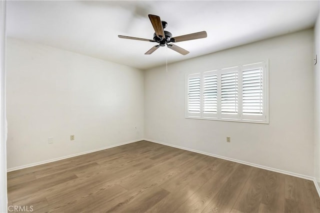 27057 Rangewood St, Menifee, CA 92586 - spare room featuring wood finished floors, baseboards, and ceiling fan
