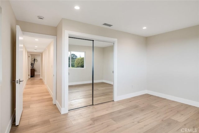 2817 San Ramon Dr, Rancho Palos Verdes, CA 90275 - unfurnished bedroom featuring light wood finished floors, a closet, recessed lighting, and baseboards