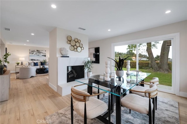 2817 San Ramon Dr, Rancho Palos Verdes, CA 90275 - dining area with recessed lighting, light wood finished floors, a premium fireplace, and baseboards
