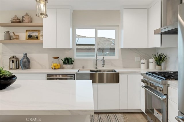 2817 San Ramon Dr, Rancho Palos Verdes, CA 90275 - kitchen featuring appliances with stainless steel finishes, a sink, white cabinetry, and modern cabinets