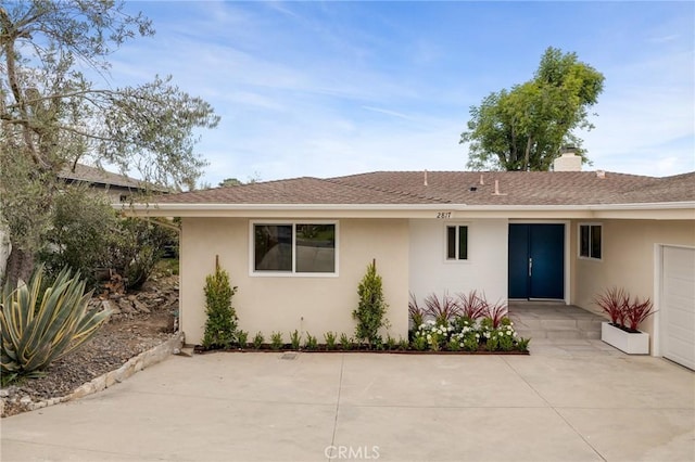 2817 San Ramon Dr, Rancho Palos Verdes, CA 90275 - view of front facade featuring stucco siding, a chimney, and a patio