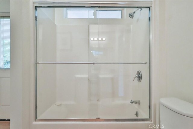 240 Portal St, Oak View, CA 93022 - full bath featuring toilet, healthy amount of natural light, and shower / bath combination with glass door