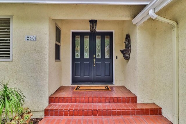 240 Portal St, Oak View, CA 93022 - view of exterior entry featuring stucco siding
