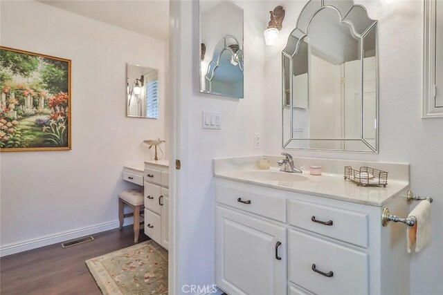 240 Portal St, Oak View, CA 93022 - bathroom with vanity, wood finished floors, and baseboards