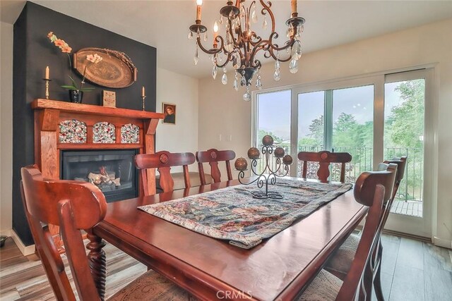 240 Portal St, Oak View, CA 93022 - dining room featuring a chandelier and wood finished floors