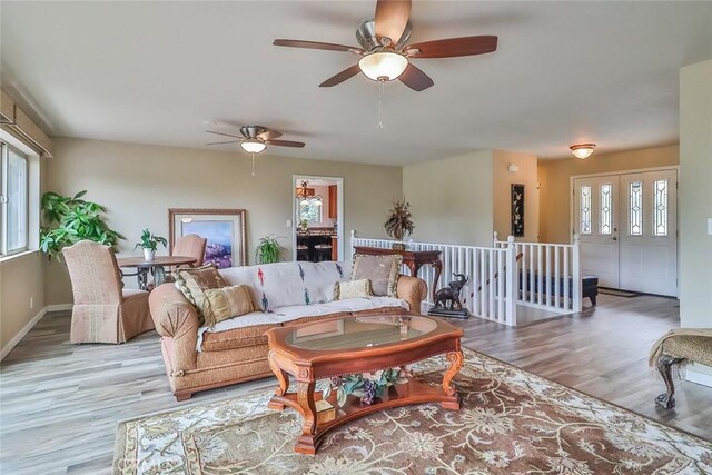240 Portal St, Oak View, CA 93022 - living area with wood finished floors, a ceiling fan, and baseboards