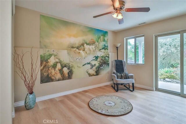 240 Portal St, Oak View, CA 93022 - living area with wood finished floors, baseboards, and ceiling fan